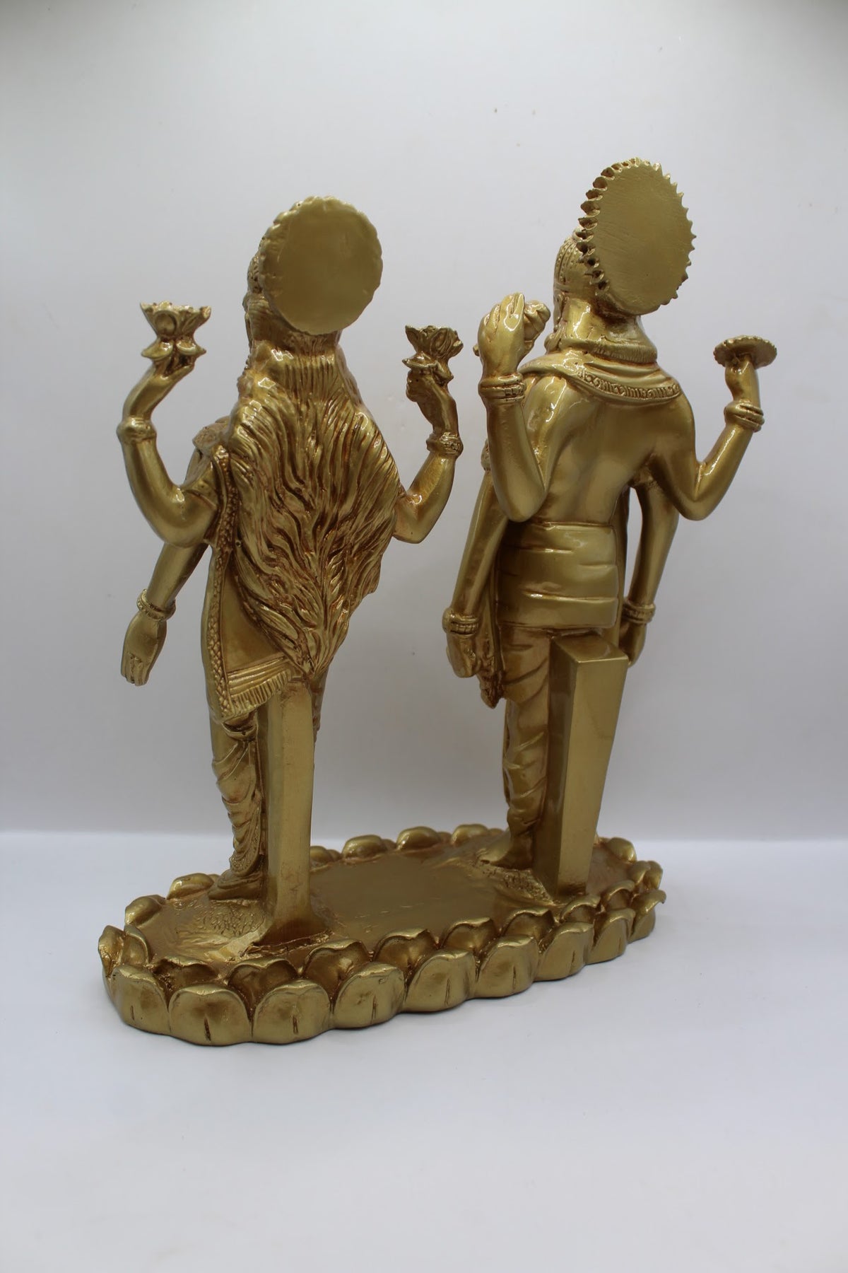 Gold resin Vishnu Laxmi murti, standing pair, back view