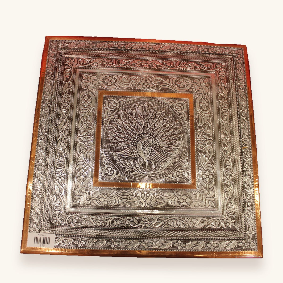 Oxidised silver bajot, top-down view of the embossed peacock panel