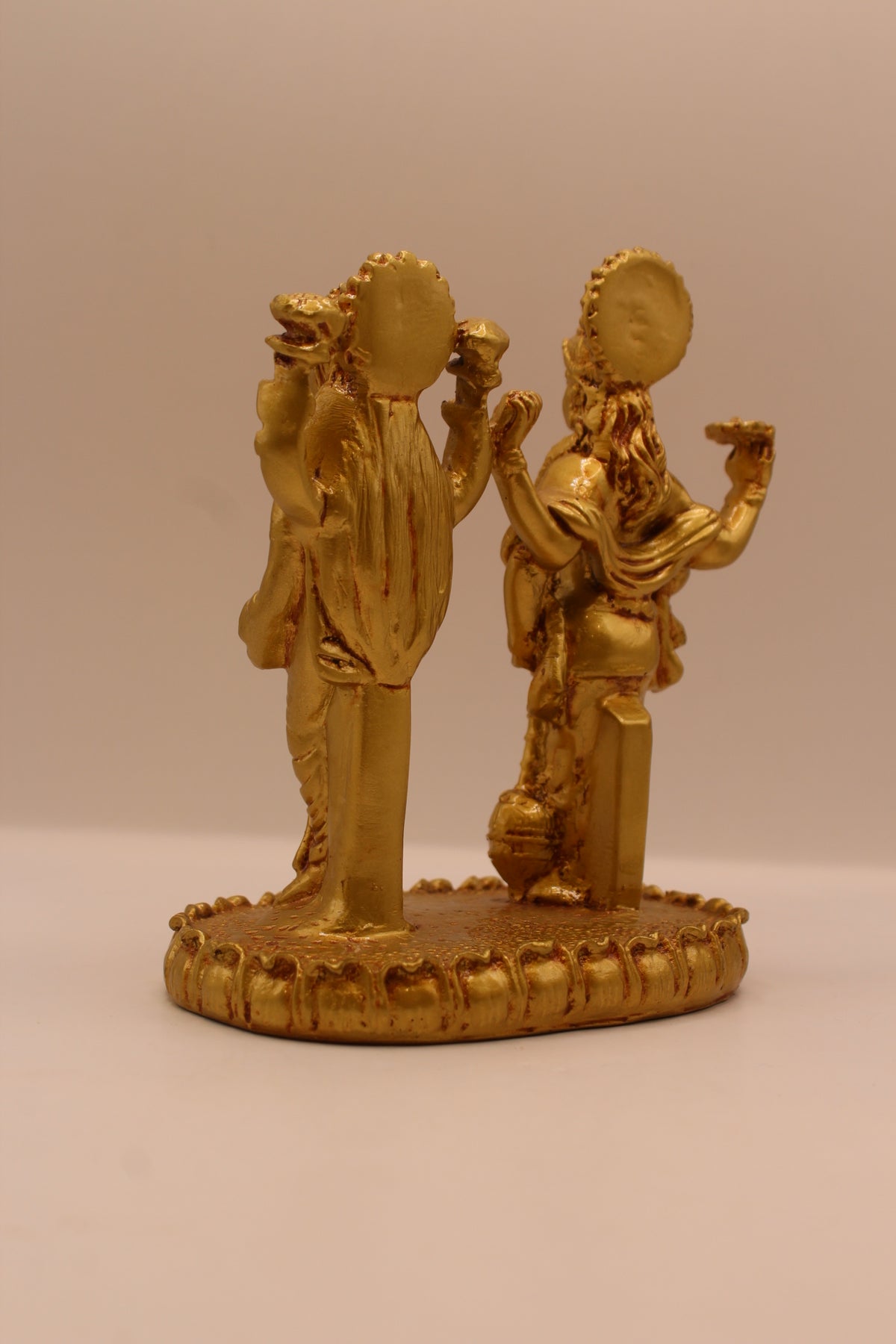 Gold Vishnu Laxmi standing statue, back