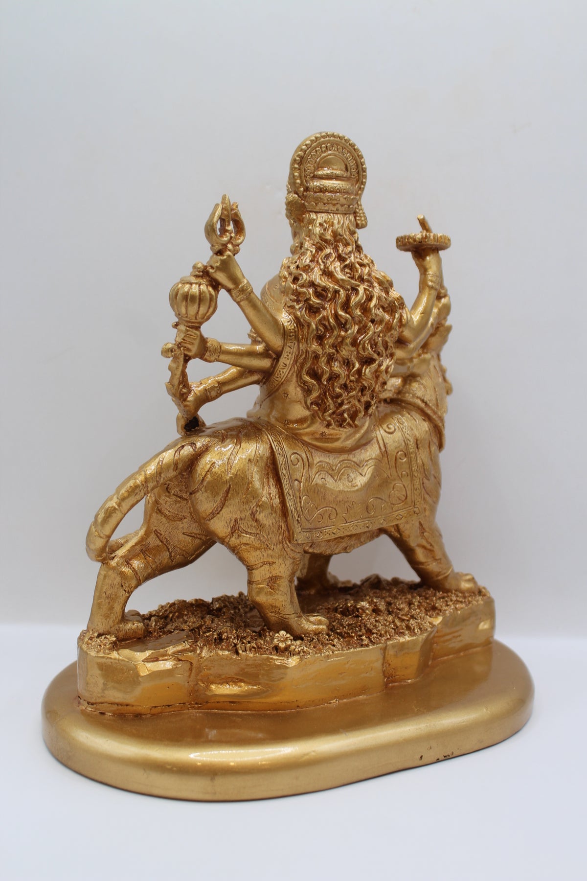 Resin Ambe Maa statue, golden finish, seated on lion, back view