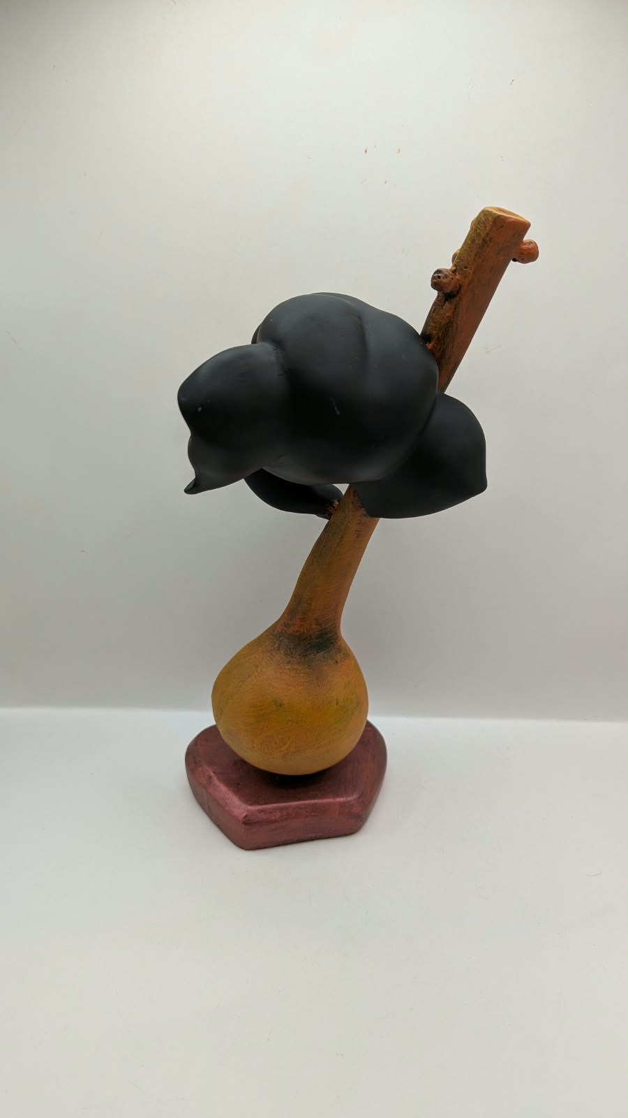 Ganesh head on veena statue, back view