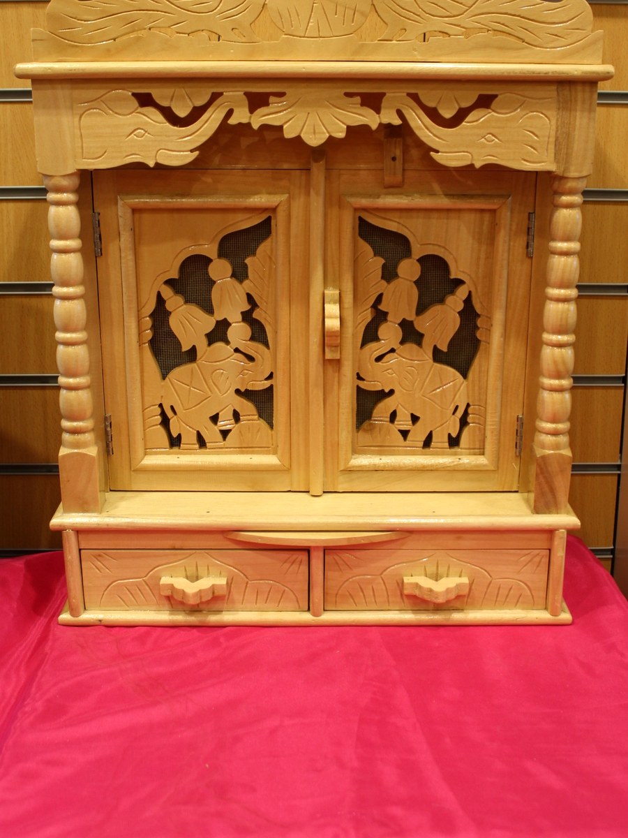 Hand-carved Sevan wood mandir with jali doors