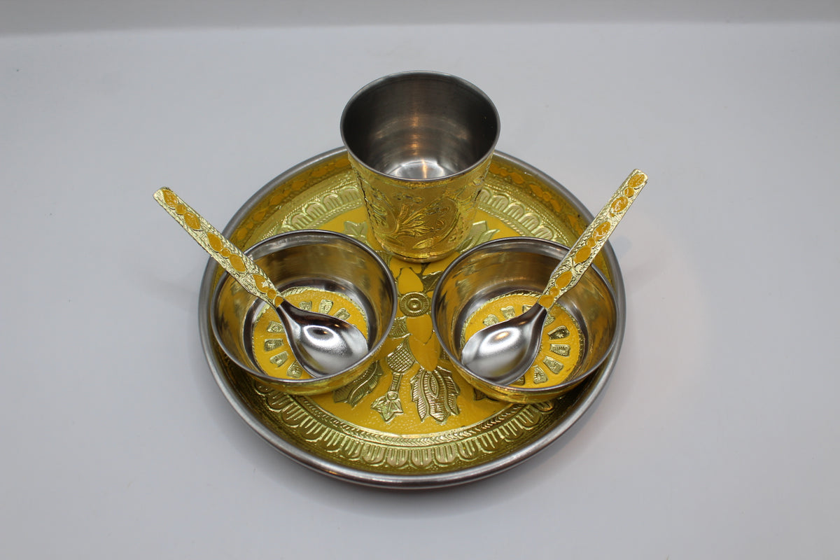 Gold pooja set No. 1 with thali, bowls, glass and spoons, front view