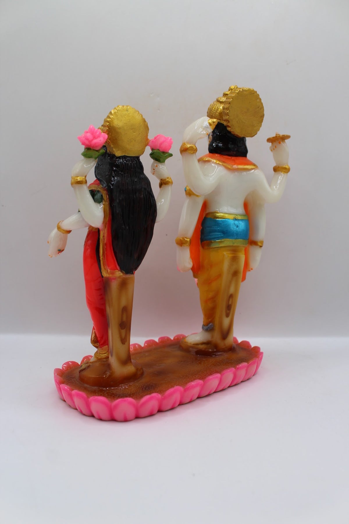 Colourful resin Vishnu Laxmi murti, standing on lotus base, back view