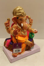 Load image into Gallery viewer, Eco-friendly clay Ganesh idol with pink khes, orange dhoti and basket throne, side view