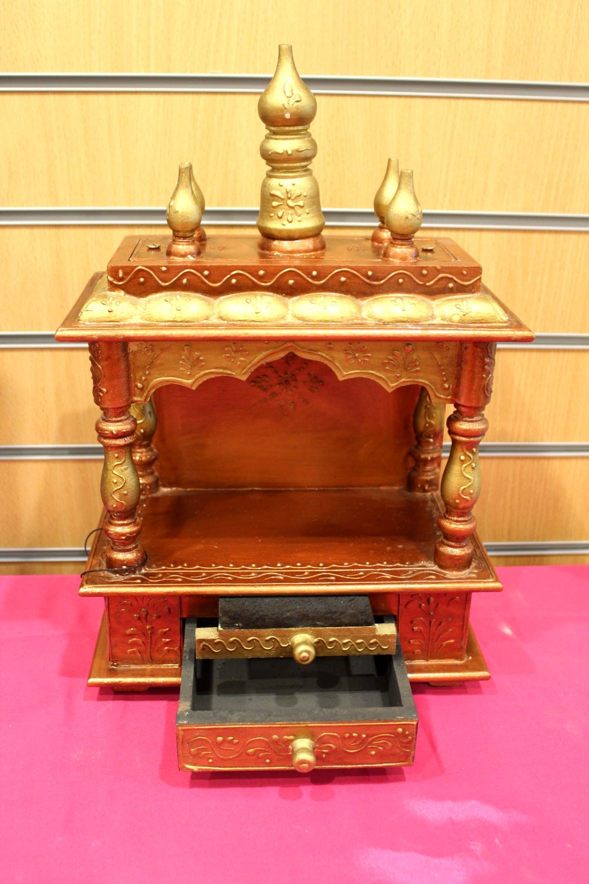 Small Jaipuri mandir with base drawer open for puja essentials