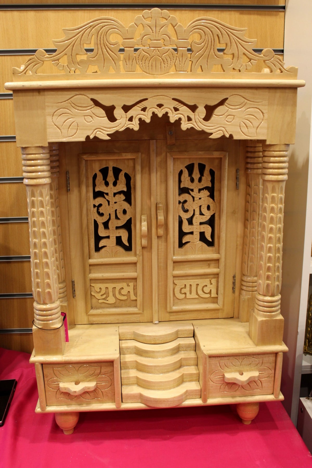 Large Sevan wood mandir with carved Shubh Labh doors closed, front view