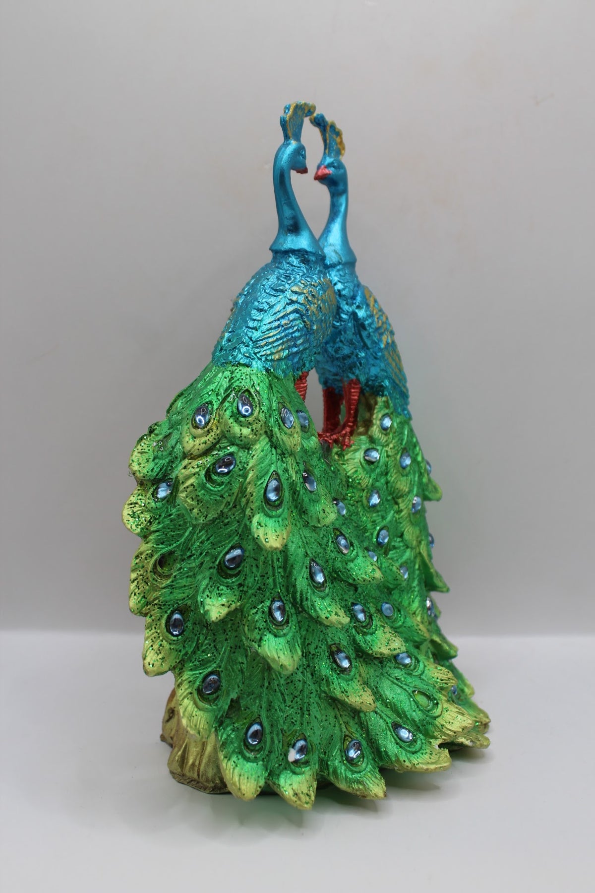 Resin peacock pair statue, heart shape, left side view
