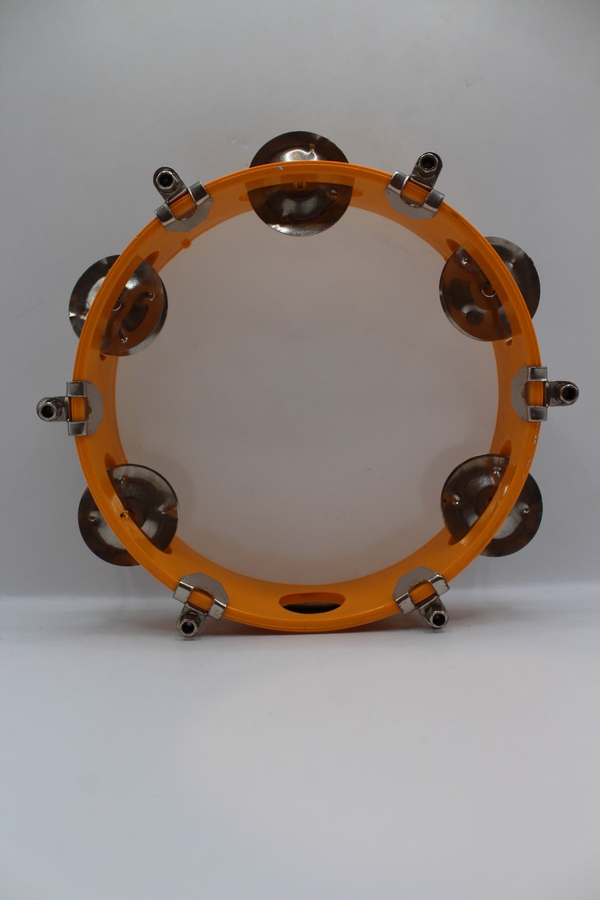 Orange khanjari tambourine 7 inch, front view