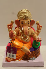Load image into Gallery viewer, Eco-friendly clay Ganesh idol with pink khes, orange dhoti and basket throne, front view