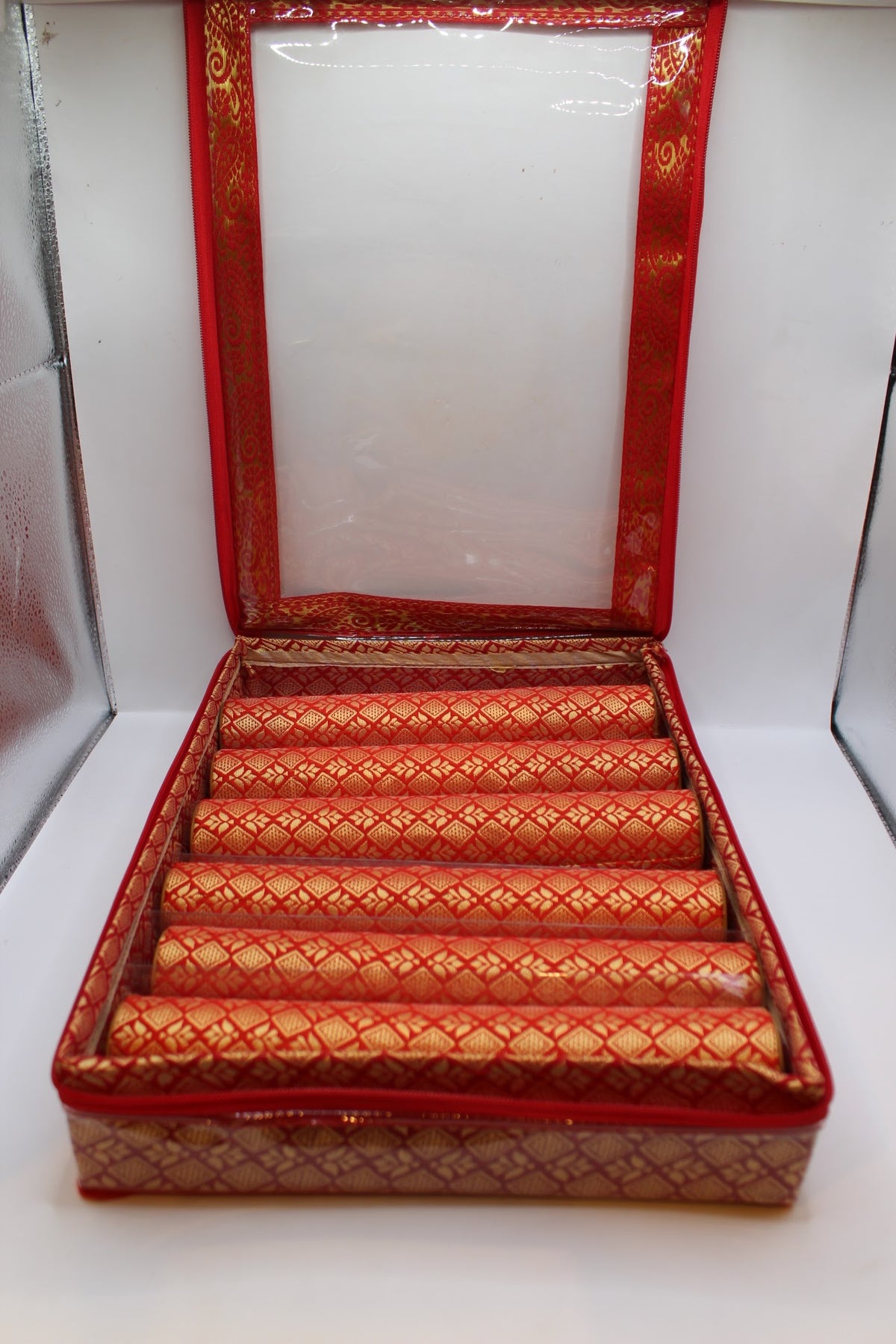 Red bangle box with 6 rolls – open