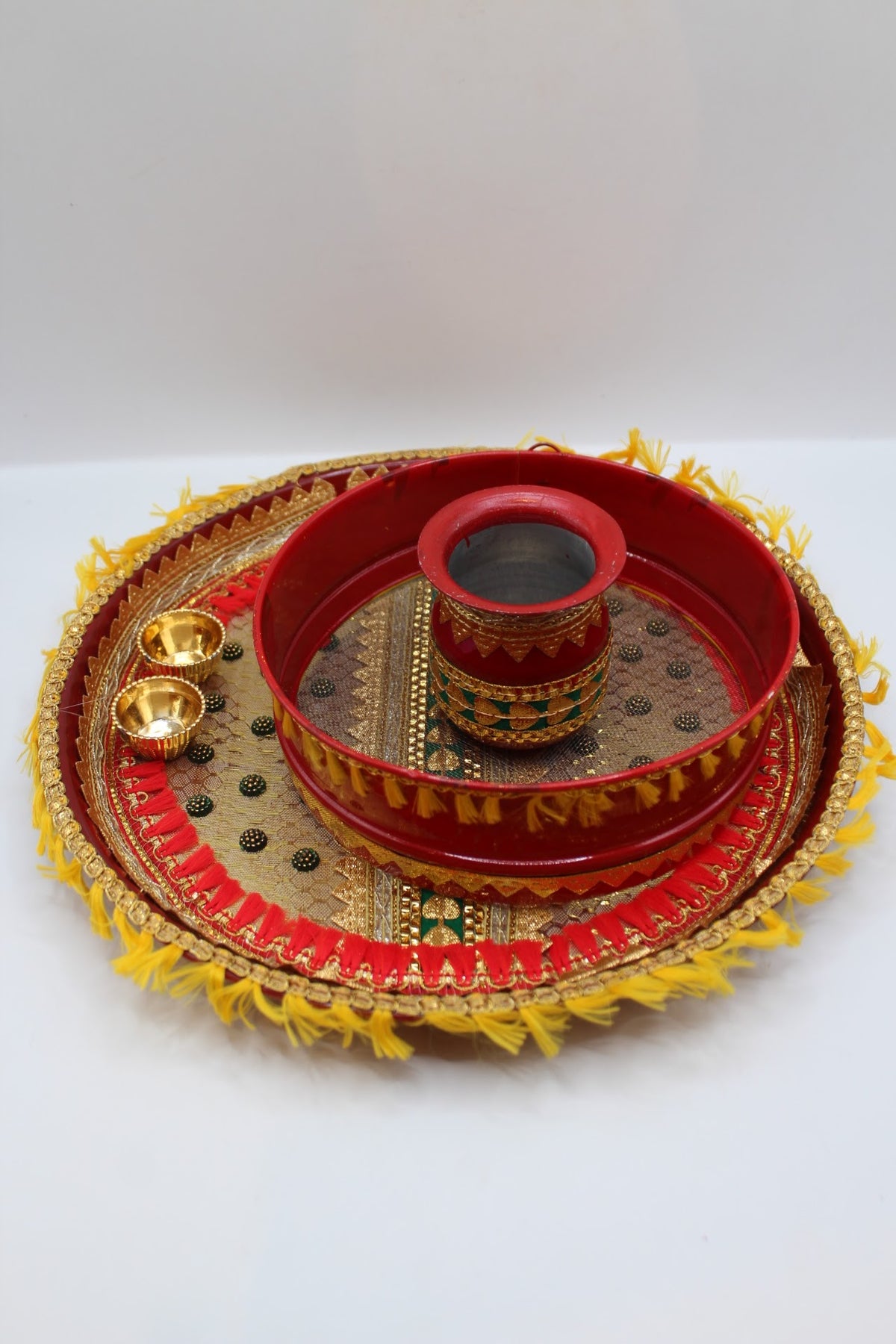 Red Karwa Chauth set with yellow fringe, thali, channi and lota, front view