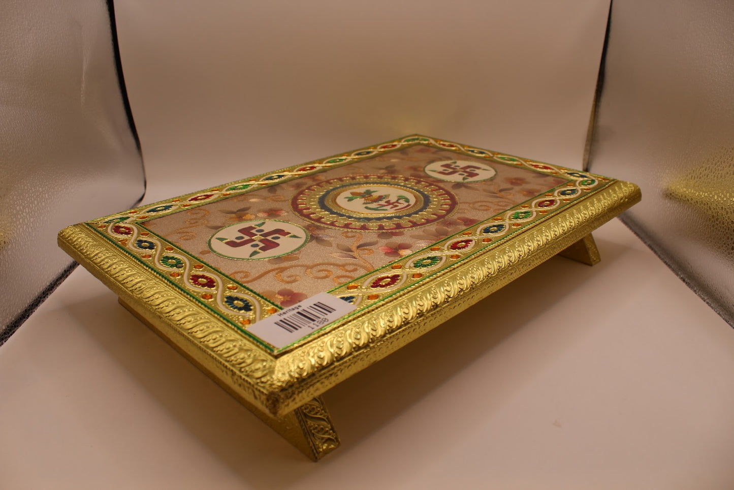 Rectangular floral meenakari chowki angled view with gold cylindrical legs