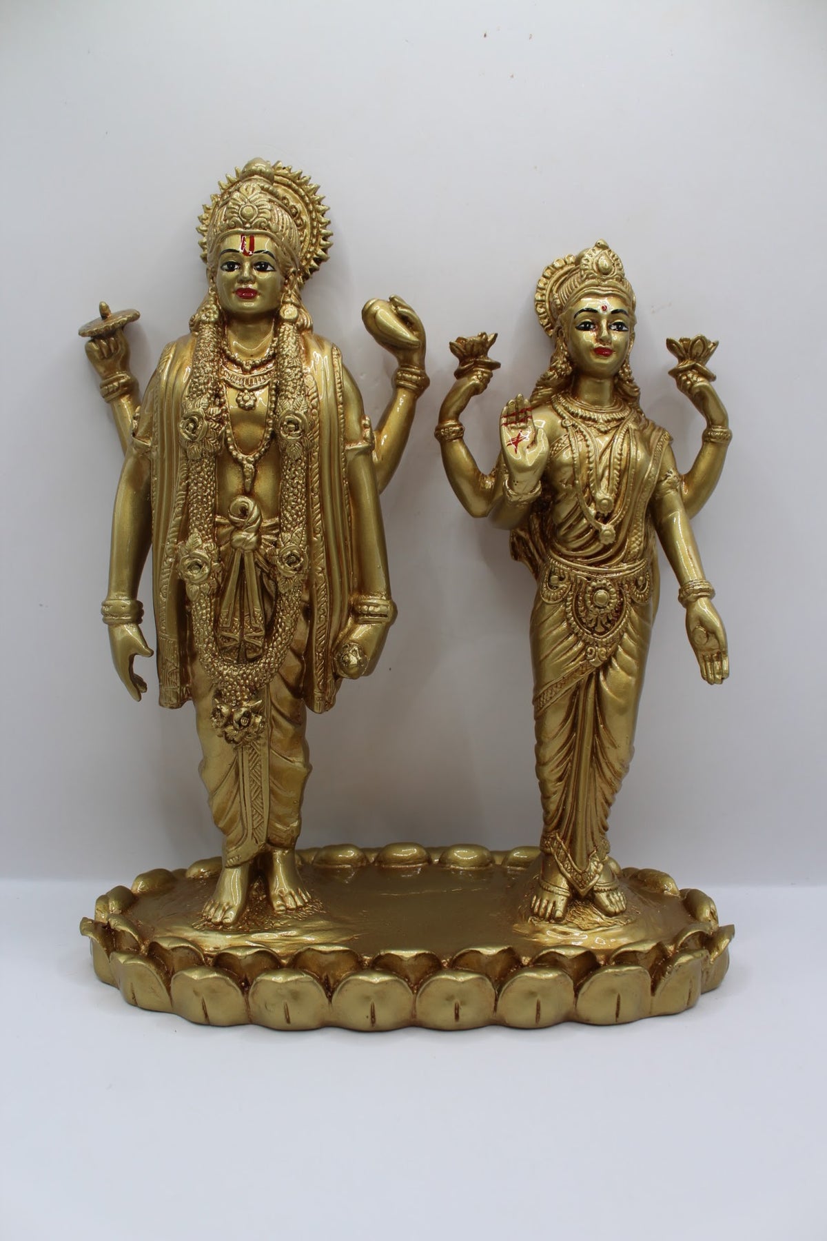 Gold resin Vishnu Laxmi murti, standing pair, front view