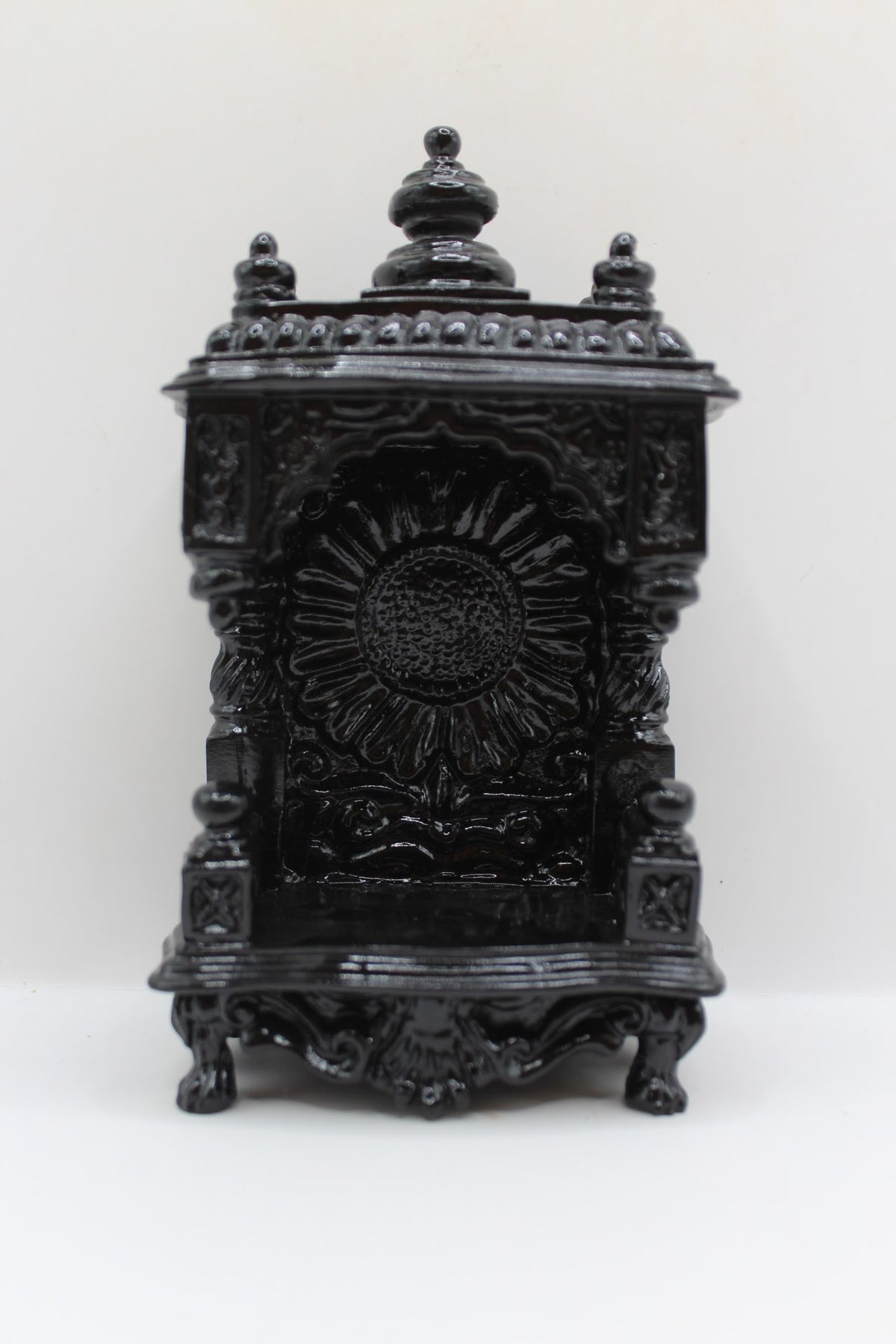 Small black mandir, front view
