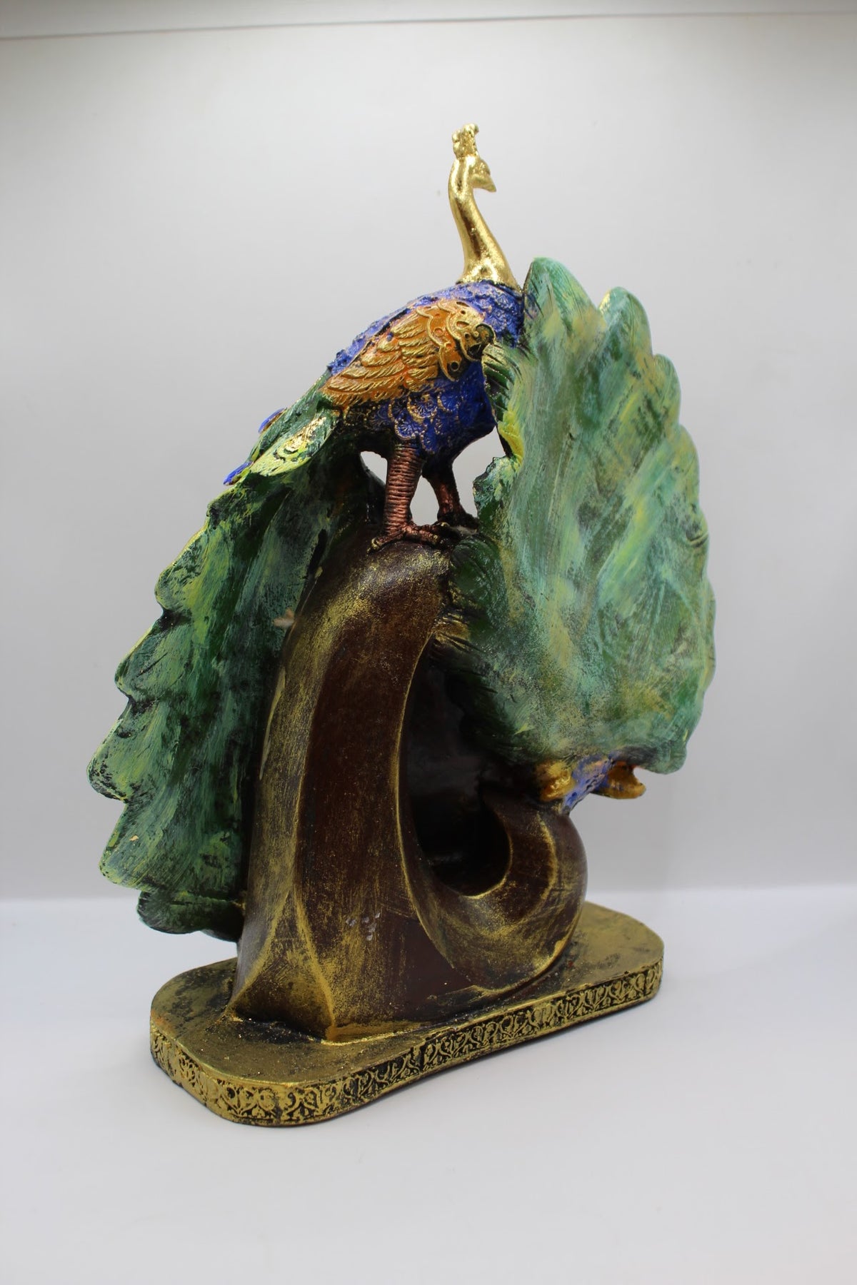Resin peacock pair statue, back view