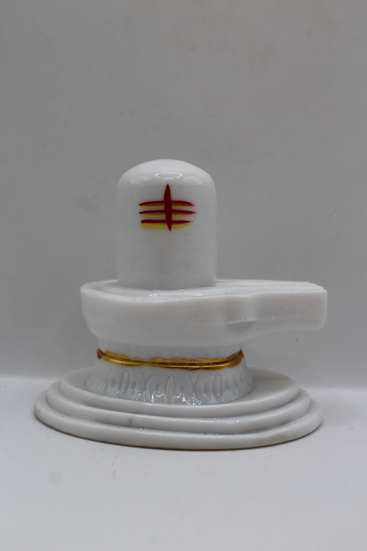 White resin Shivling with tripundra, front view