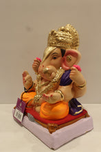 Load image into Gallery viewer, Eco-friendly clay Ganesh idol with purple shawl and orange dhoti, side view