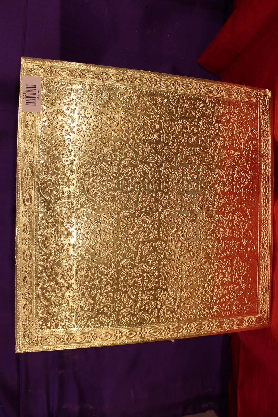 Premium gold embossed bajot pooja chowki close-up of embossed detail