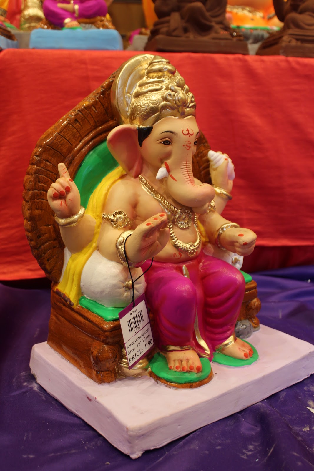 Eco-Friendly Ganesh Visarjan idol, Gold Khes & Magenta Dhoti, close-up