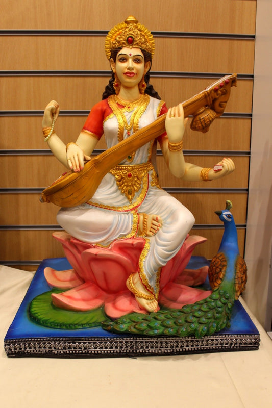 Resin/Fibre Saraswati Statue for Home Temple – Veena on Lotus with Peacock, 25 inch