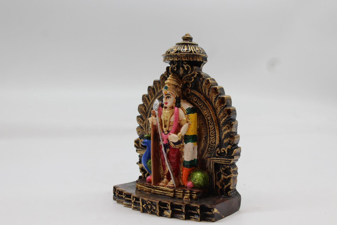 Standing Lord Murugan Idol with Peacock – Temple Arch Base - Red - angled view