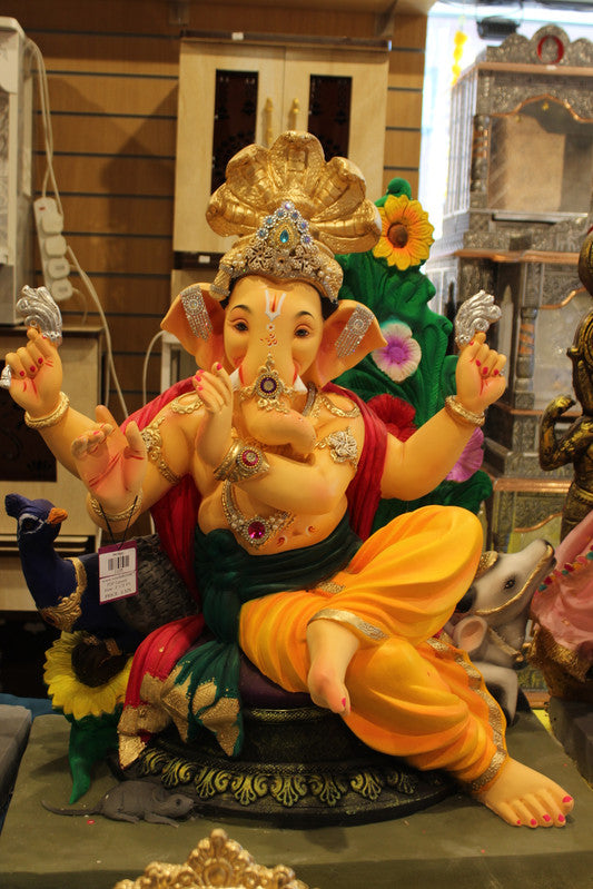 POP Ganesh Visarjan Idol - Green Sash & Saffron Dhoti, Peacock Base, ~2.5ft - angle
