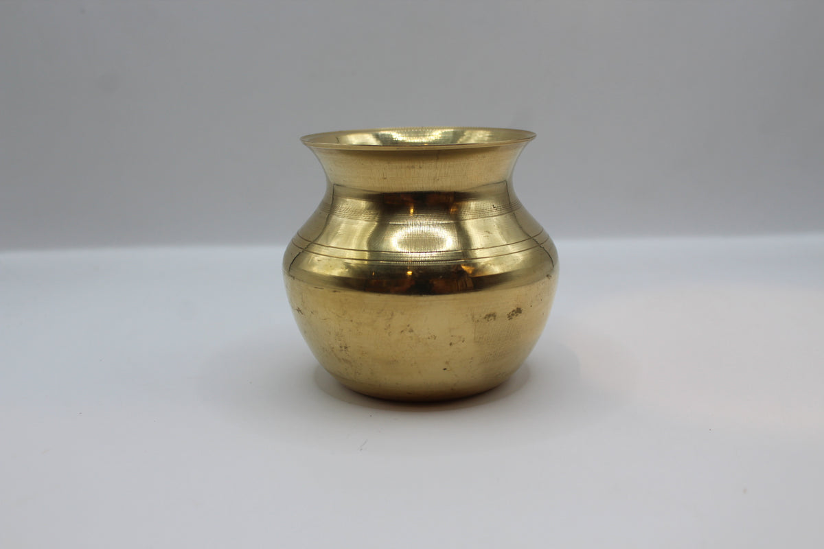 Medium brass lota, side view