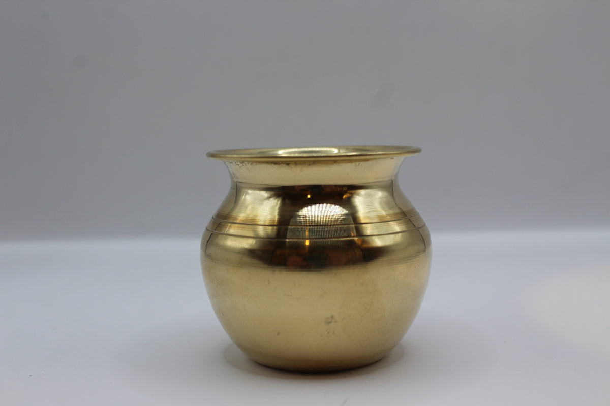 Small brass lota, side view