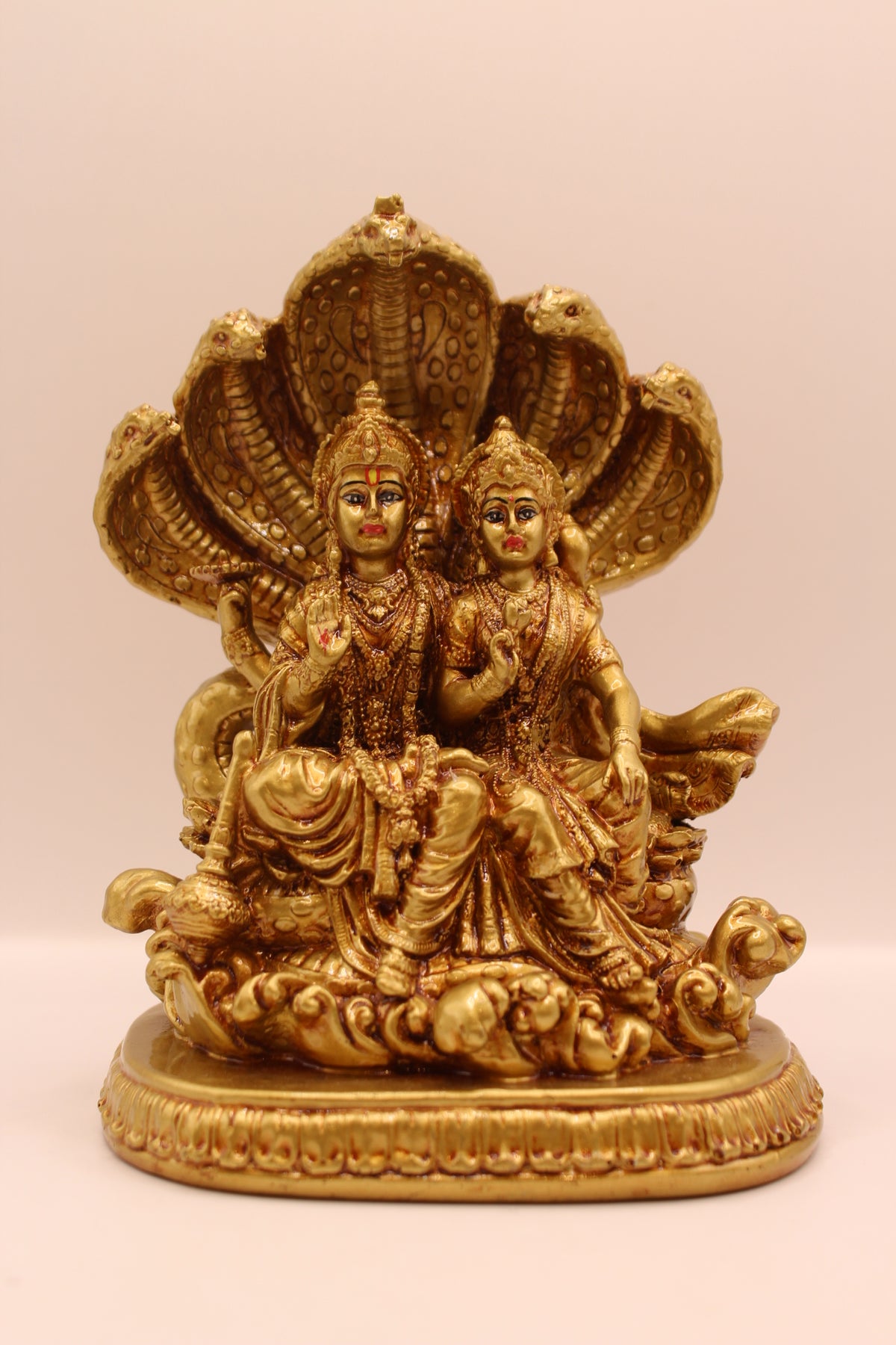 Gold Vishnu Laxmi on Sheshnag resin statue, front