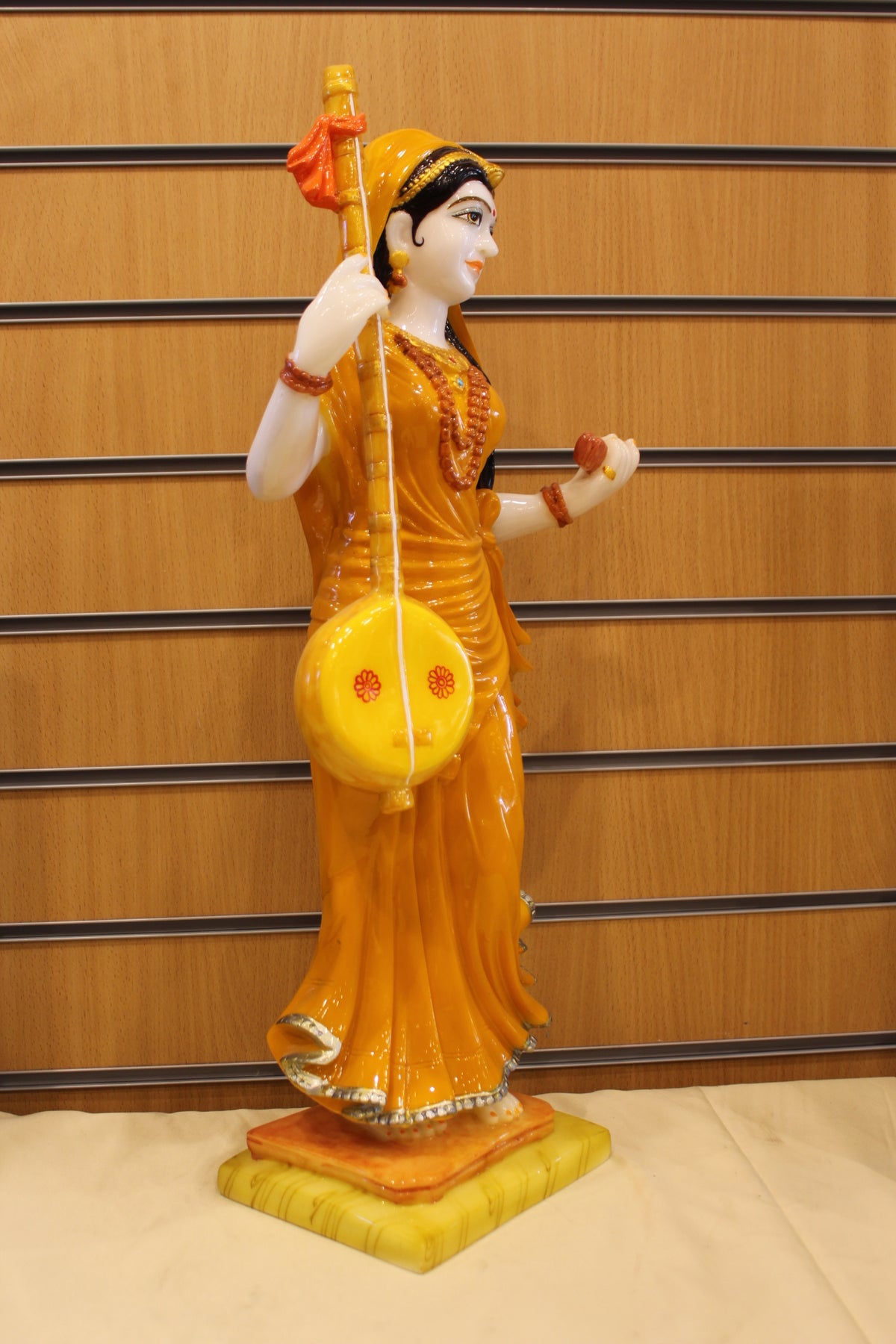 Resin/Fibre Mira Bai Statue – Standing with Tanpura, Orange Sari, 24 inch – left side view