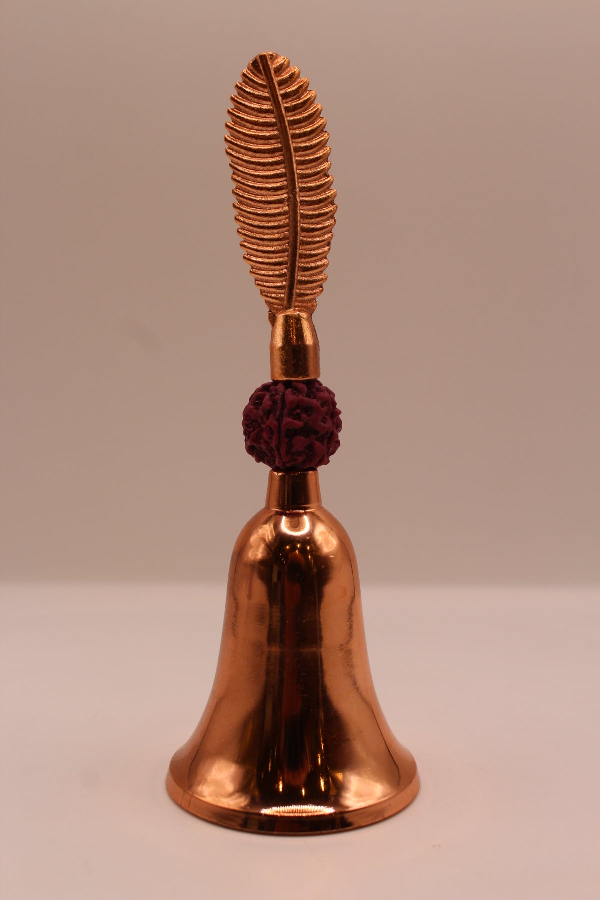 Rudraksha pooja bell, rose gold, front