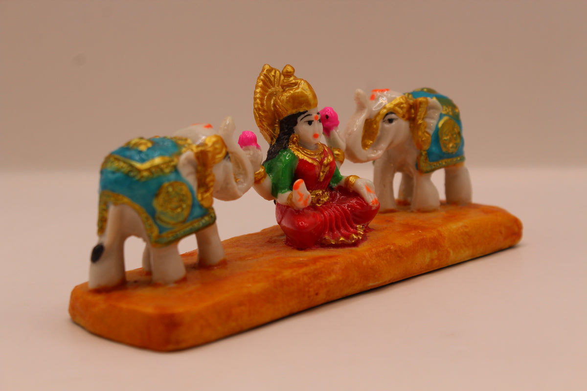 Gaja Laxmi resin statue, left side