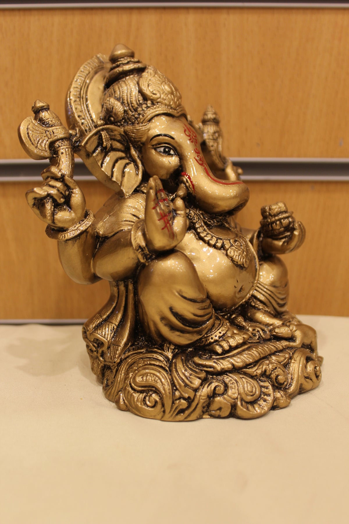 Resin/Fibre Ganesh Statue – Antique Gold, Small, 6 to 7 inch – Seated on Clouds – 6 inch – left side view