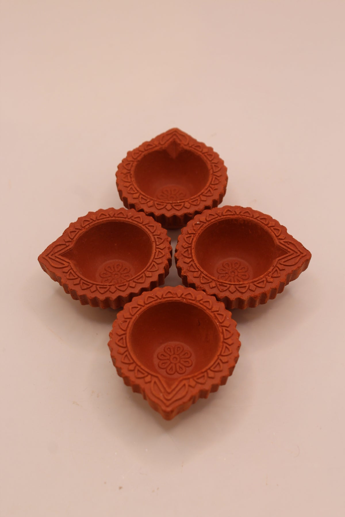 Pack of 4 festive clay diyas from above