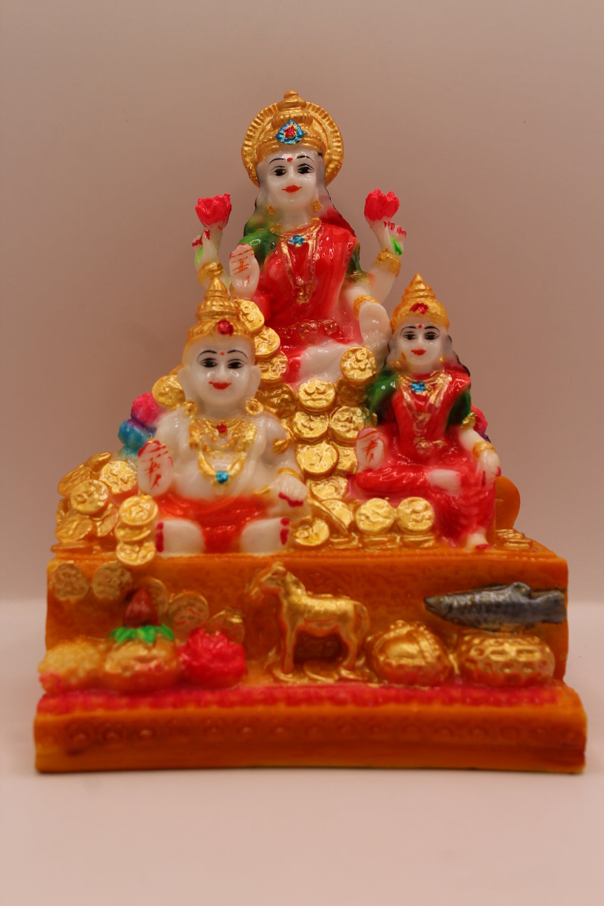 Kuber Laxmi Dhanvantri resin statue with gold coins, front