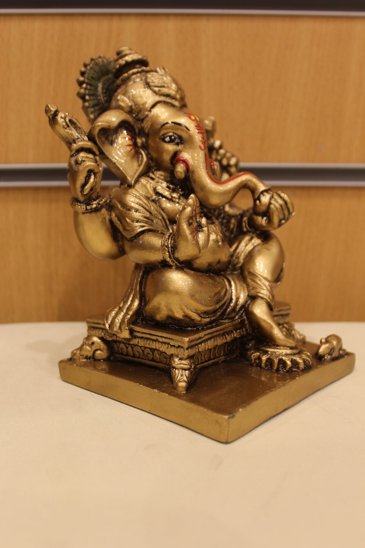 Resin/Fibre Ganesh Statue – Antique Gold, Small, 6 to 7 inch – Seated on Chowki – 6 inch – left side view
