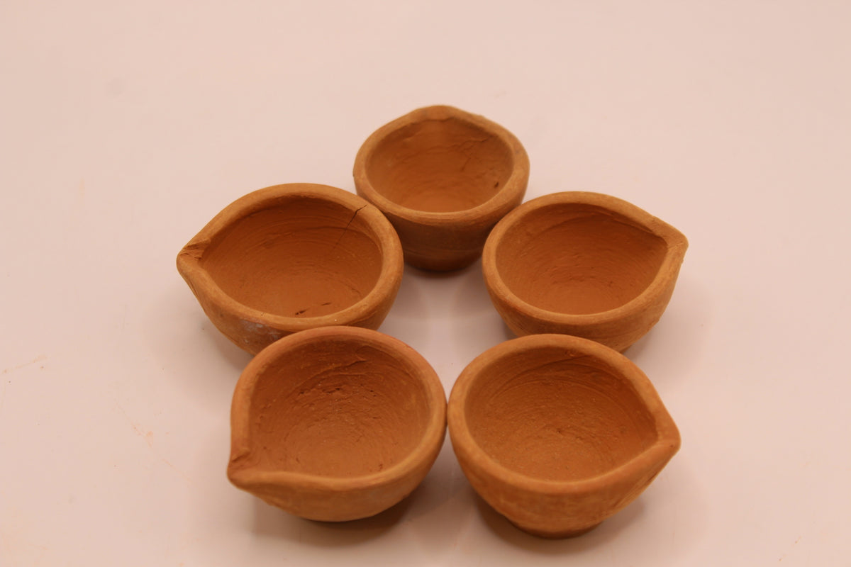 Pack of 5 plain clay diyas from above