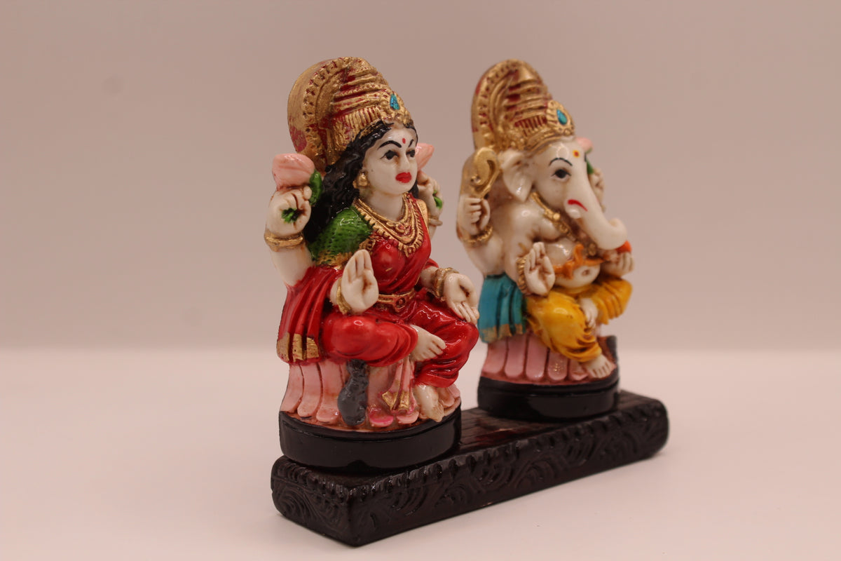Ganesh Laxmi resin murti pair, left side