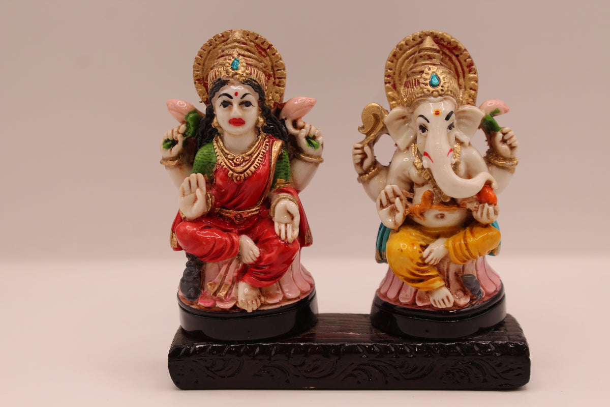 Ganesh Laxmi resin murti pair, front