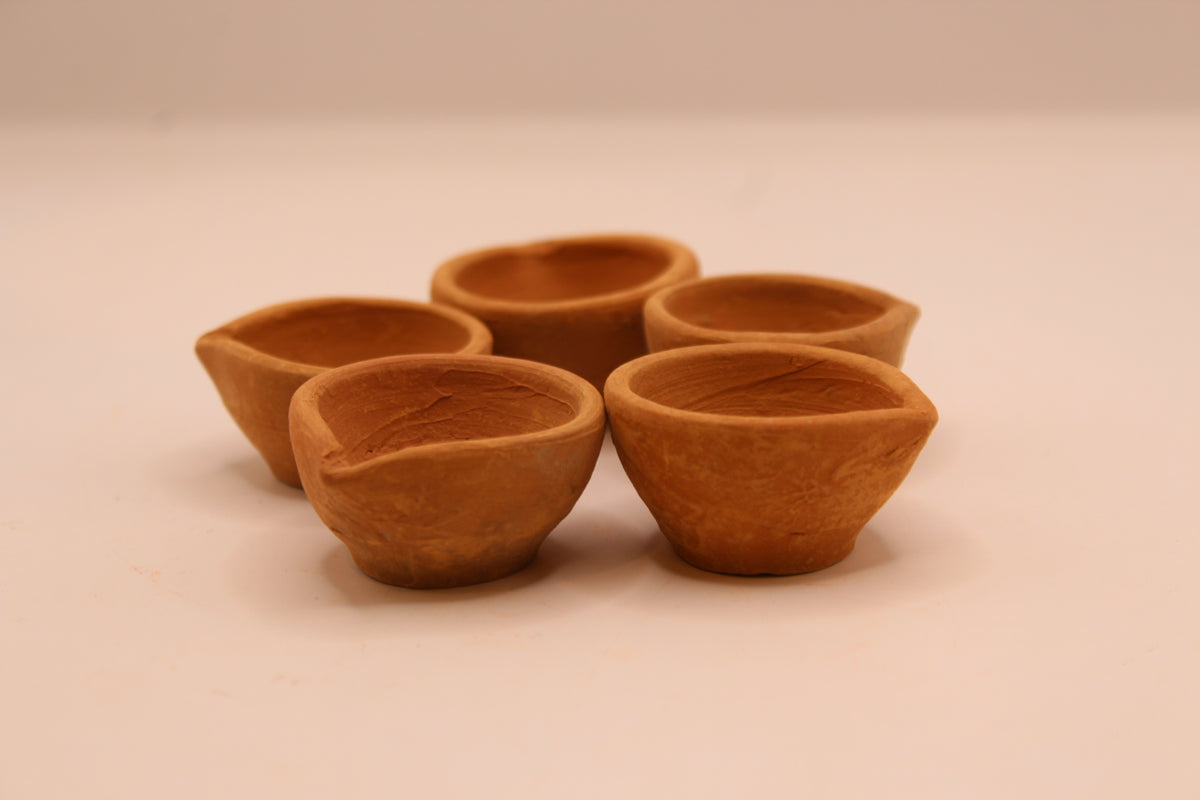 Plain clay diyas, angle