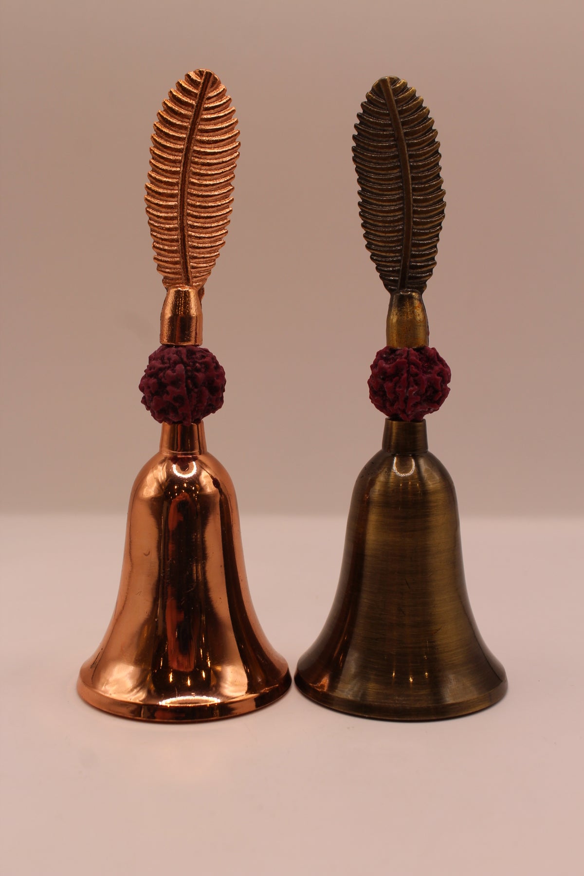 Rudraksha pooja bells in rose gold and antique bronze