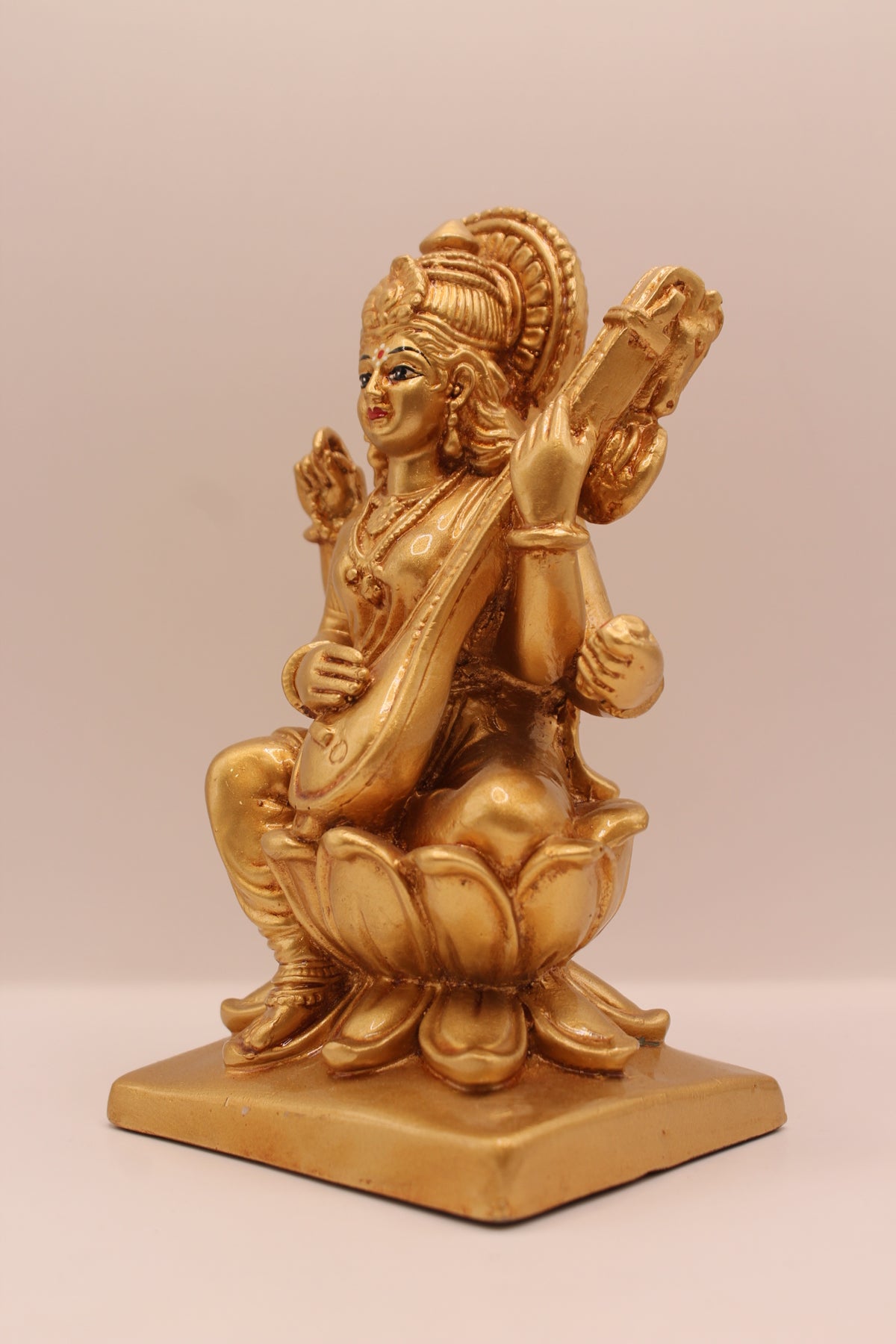 Gold Saraswati statue, right side