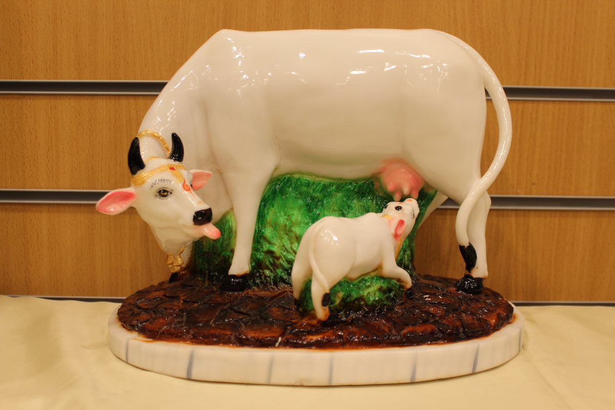 Resin/Fibre Kamdhenu Cow and Calf Statue – White on Grass Base, 10 inch – front view