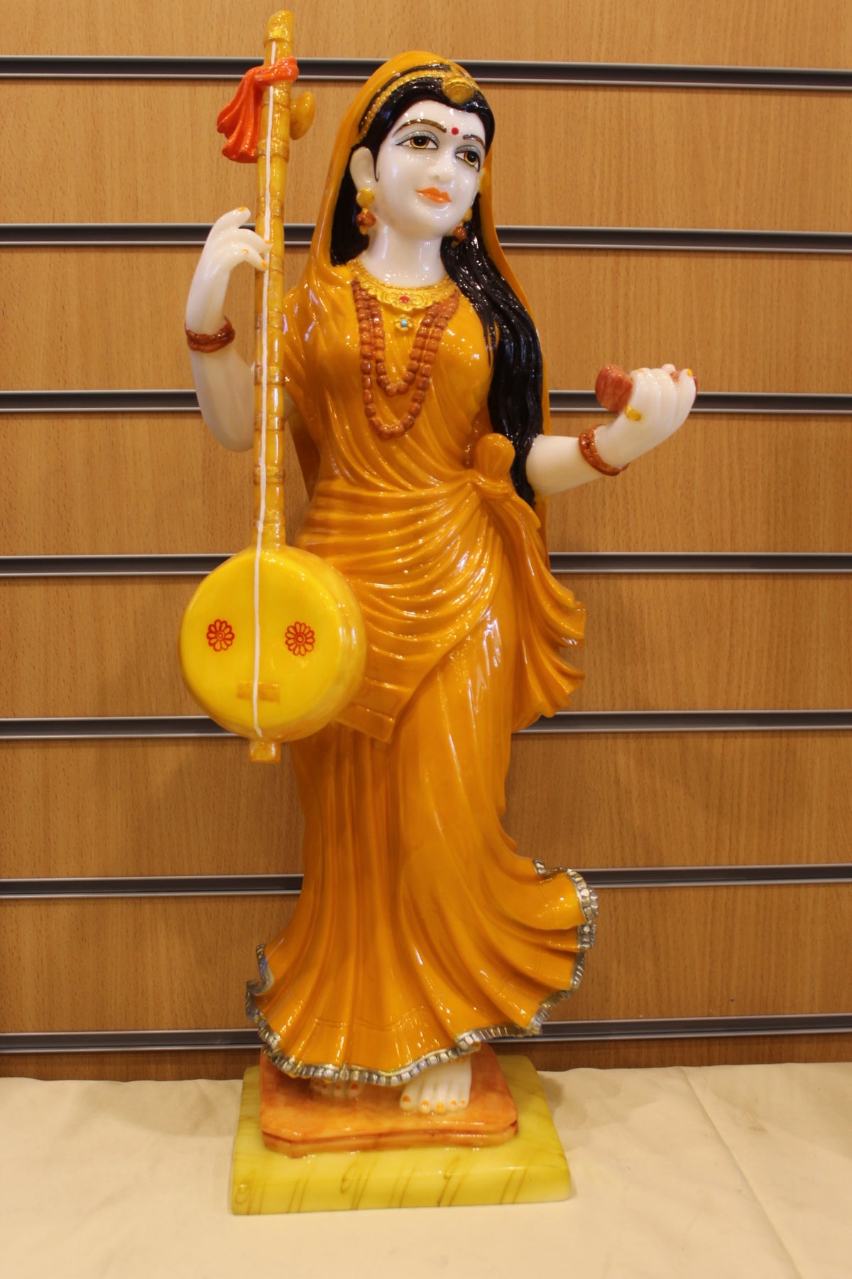 Resin/Fibre Mira Bai Statue – Standing with Tanpura, Orange Sari, 24 inch – front view