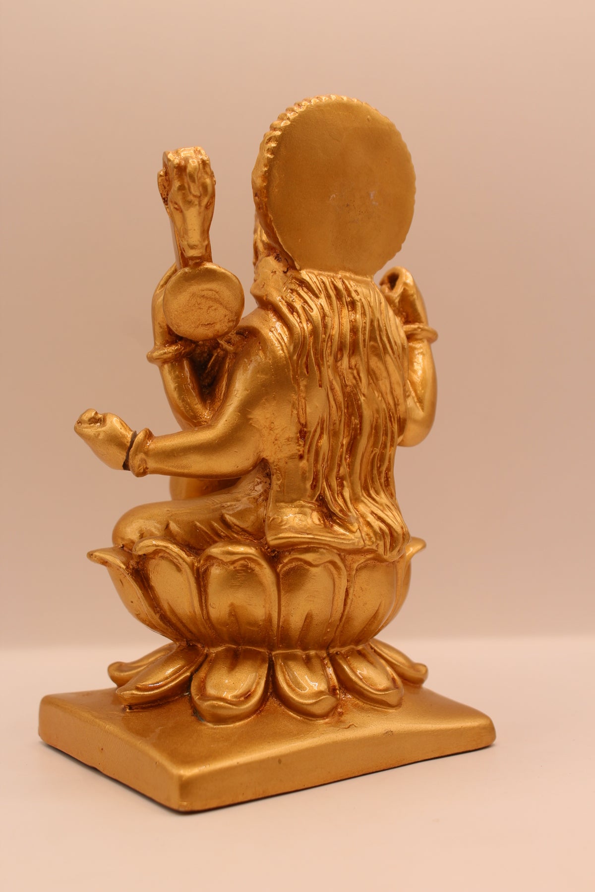 Gold Saraswati statue, back
