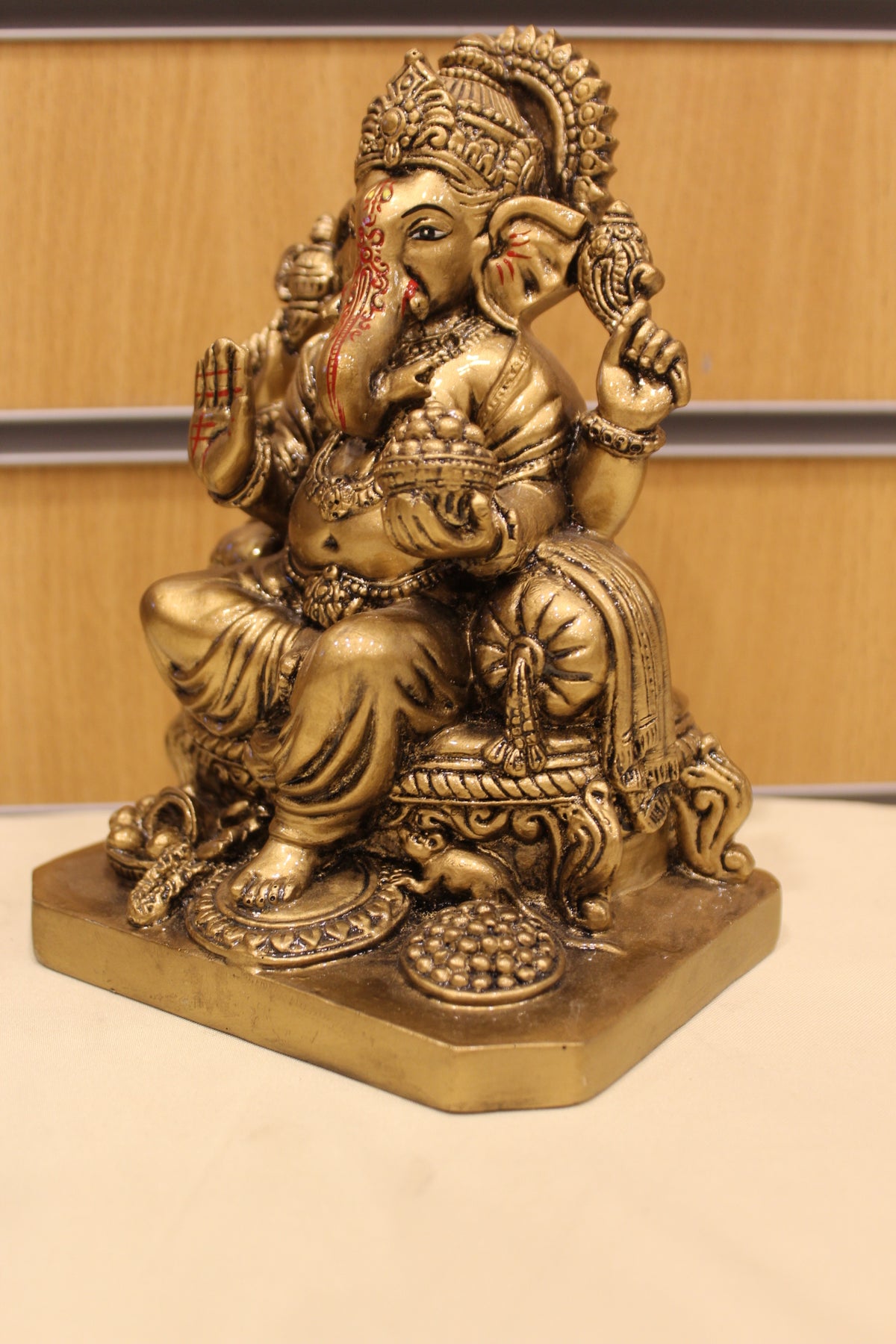 Resin/Fibre Ganesh Statue – Antique Gold, Small, 6 to 7 inch – Seated on Throne – 7 inch – right side view