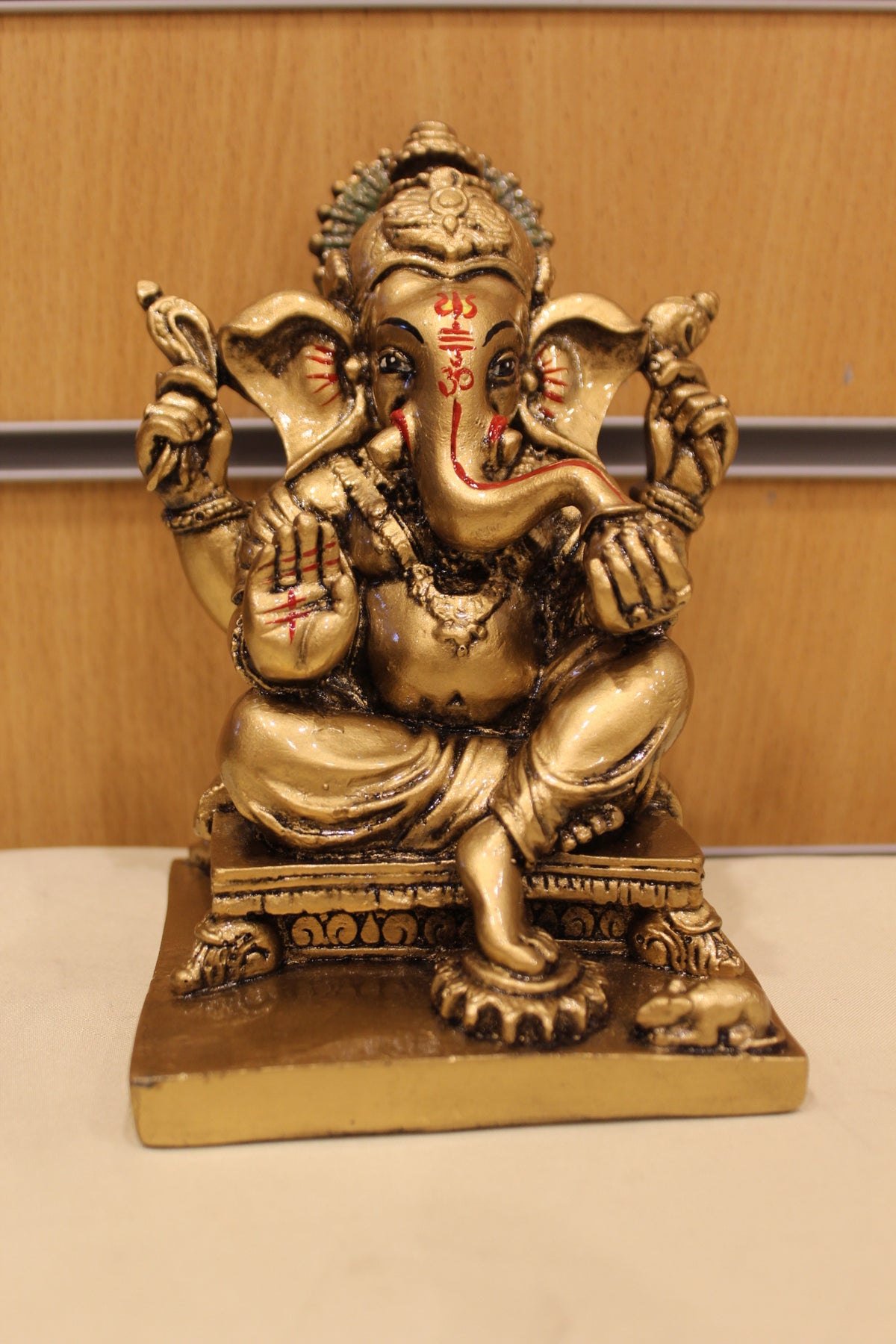Resin/Fibre Ganesh Statue – Antique Gold, Small, 6 to 7 inch – Seated on Chowki – 6 inch – front view