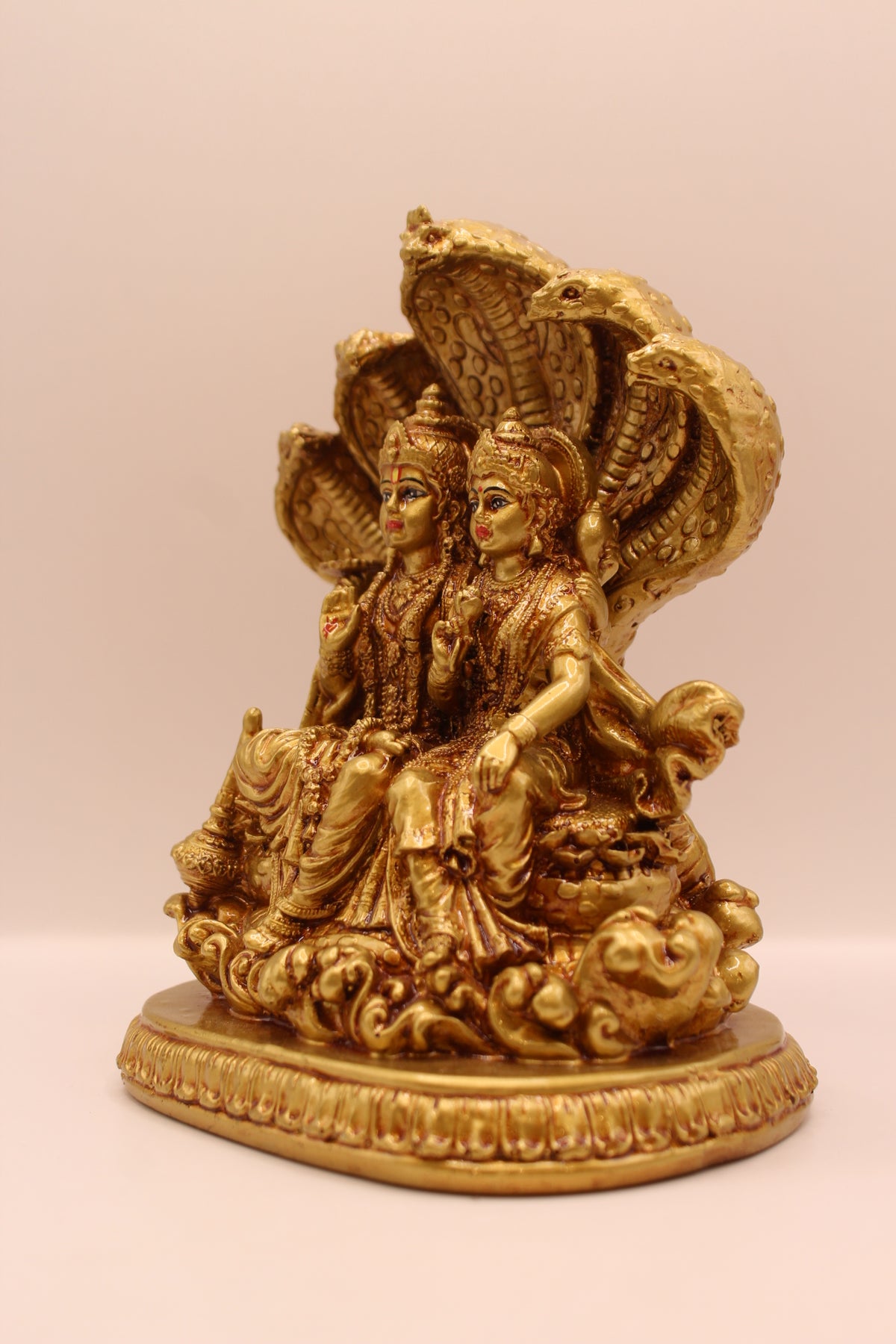 Gold Vishnu Laxmi on Sheshnag statue, right side