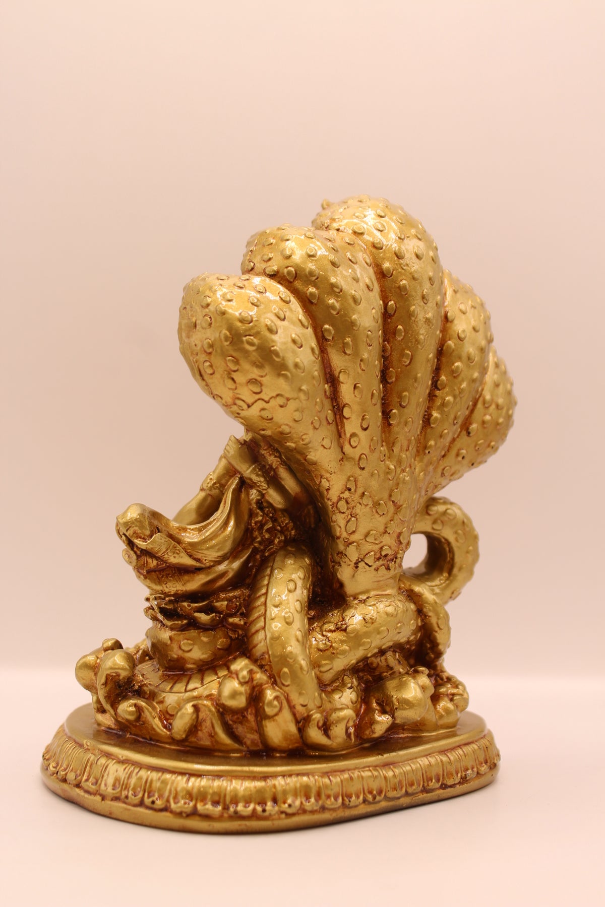 Gold Vishnu Laxmi on Sheshnag statue, back
